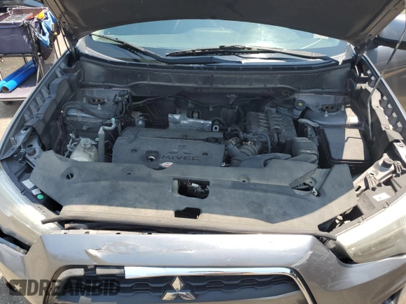 2015 Mitsubishi Outlander SE with VIN 4A4AR4AU2FE011699, listed as a Copart auction lot 60509945 with 141,192 mi miles and Salvage title. Bid and sale history available at DreamBid. Image 12.