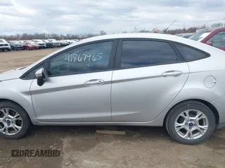 2016 Ford Fiesta SE with VIN 3FADP4BJ7GM142790, listed as a IAAI auction lot 41867965 with 108,979 mi miles. Bid and sale history available at carsss.com. Image 14.