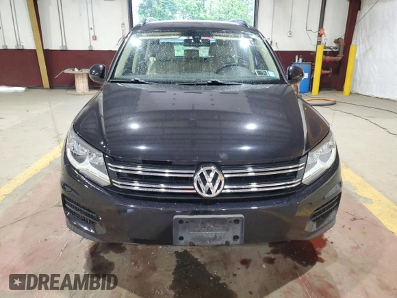 2017 Volkswagen Tiguan S with VIN WVGBV7AX8HK016490, listed as a Copart auction lot 56222815 with 48,439 mi miles and Salvage Title. Bid and sale history available at DreamBid. Image 5.