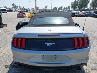 2021 Ford Mustang EcoBoost z VIN 1FATP8UH2M5120162, wystawiony jako IAAI lot #42561125 z przebiegiem 55 360 mil mil oraz . Historia ofert i sprzedaży dostępna na DreamBid. Obrazek 17.