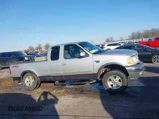 2003 Ford F-150 XL z VIN 1FTRX18W53NA29776, wystawiony jako IAAI lot #41413445 z przebiegiem 231 533 mil mil oraz . Historia ofert i sprzedaży dostępna na DreamBid. Obrazek 13.