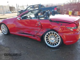2007 Mercedes-Benz SLK 55 AMG with VIN WDBWK73F07F150189, listed as a IAAI auction lot 41334201 with 70,634 mi miles and . Bid and sale history available at DreamBid. Image 3.