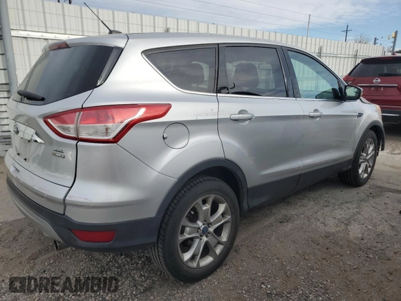2013 Ford Escape SEL with VIN 1FMCU9H92DUA78976, listed as a Copart auction lot 50823805 with 250,956 mi miles and Salvage Title. Bid and sale history available at DreamBid. Image 3.