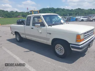 1990 Ford Ranger z VIN 1FTCR14T2LPB21654, wystawiony jako IAAI lot #42270150 z przebiegiem 92 465 mil mil oraz . Historia ofert i sprzedaży dostępna na DreamBid. Obrazek 1.