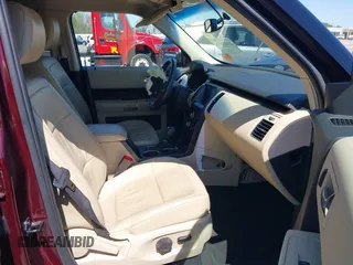 2019 Ford Flex SEL z VIN 2FMHK6C89KBA13151, wystawiony jako IAAI lot #41985585 z przebiegiem 94 031 mil mil oraz . Historia ofert i sprzedaży dostępna na DreamBid. Obrazek 5.