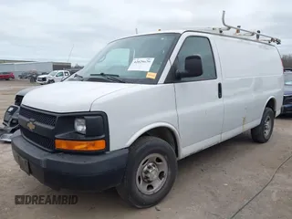 2015 Chevrolet Express Cargo Van with VIN 1GCWGFCFXF1259591, listed as a IAAI auction lot 42029679 with 144,023 mi miles. Bid and sale history available at carsss.com. Image 2.