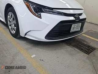 2024 Toyota Corolla LE with VIN 5YFB4MDE6RP133424, listed as a IAAI auction lot 42852869 with 25,073 mi miles and . Bid and sale history available at DreamBid. Image 4.