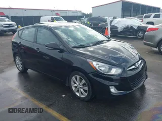 2013 Hyundai Accent SE with VIN KMHCU5AE8DU092543, listed as a IAAI auction lot 41476184 with 100,723 mi miles. Bid and sale history available at carsss.com. Image 1.