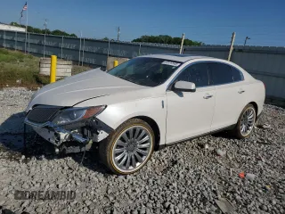 2015 Lincoln MKS z VIN 1LNHL9DKXFG604614, wystawiony jako Copart lot #53576545 z przebiegiem 103 497 mil mil oraz Szkoda całkowita • Salvage title. Historia ofert i sprzedaży dostępna na DreamBid. Obrazek 1.