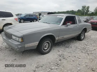 1987 Chevrolet Monte Carlo z VIN 1G1GZ11H0HP121525, wystawiony jako Copart lot #60237585 z przebiegiem 9 794 mil mil oraz Czysty tytuł • Clean title. Historia ofert i sprzedaży dostępna na DreamBid. Obrazek 1.