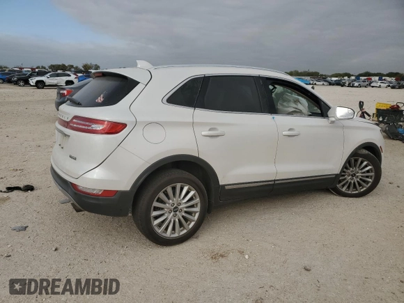 2019 Lincoln MKC Standard with VIN 5LMCJ1D95KUL45392, listed as a Copart auction lot 82561394 with 104,748 mi miles and Salvage Title. Bid and sale history available at DreamBid. Image 3.