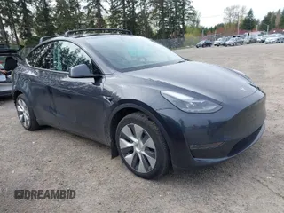 2024 Tesla Model Y Long Range with VIN 7SAYGAEE5RF981789, listed as a IAAI auction lot 41991292 with 21,103 mi miles. Bid and sale history available at carsss.com. Image 1.