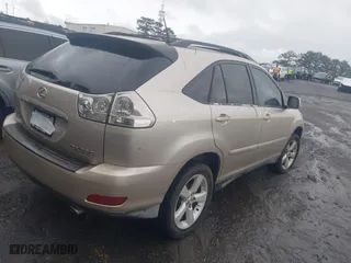 2005 Lexus RX 330 with VIN 2T2GA31U75C025694, listed as a IAAI auction lot 41982671 with 243,781 mi miles. Bid and sale history available at carsss.com. Image 4.