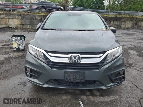 2018 Honda Odyssey EX-L z VIN 5FNRL6H75JB076769, wystawiony jako Copart lot #56845755 z przebiegiem 92 552 mil mil oraz Szkoda całkowita • Salvage title. Historia ofert i sprzedaży dostępna na DreamBid. Obrazek 5.