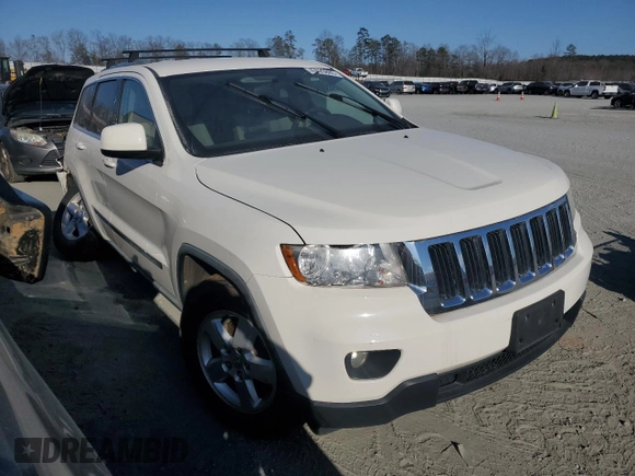 2012 Jeep Grand Cherokee Laredo with VIN 1C4RJFAG0CC201435, listed as a Copart auction lot 47026885 with 205,603 mi miles and Salvage Title. Bid and sale history available at carsss.com. Image 4.