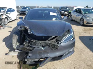 2018 Tesla Model S 75D with VIN 5YJSA1E49JF294699, listed as a IAAI auction lot 41567770 with 34,644 mi miles and . Bid and sale history available at DreamBid. Image 12.