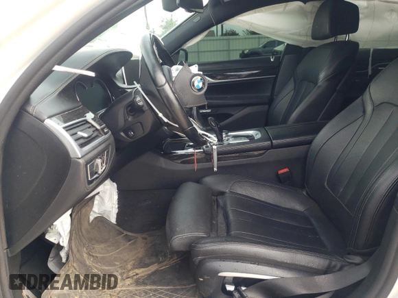 2016 BMW 7 Series 740i with VIN WBA7E2C53GG739056, listed as a Copart auction lot 59141613 with 0 mi miles. Bid and sale history available at carsss.com. Image 7.
