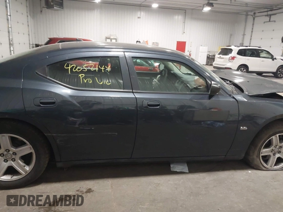 2008 Dodge Charger with VIN 2B3KA43G88H305583, listed as a IAAI auction lot 42052144 with 119,310 mi miles and . Bid and sale history available at DreamBid. Image 13.