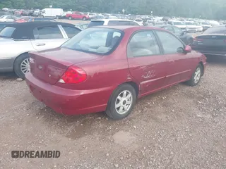 2003 Kia Spectra z VIN KNAFB121X35293054, wystawiony jako IAAI lot #42274932 z przebiegiem 108 978 mil mil oraz . Historia ofert i sprzedaży dostępna na DreamBid. Obrazek 4.
