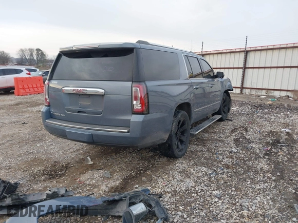 2015 GMC Yukon XL Denali with VIN 1GKS2JKJ3FR616122, listed as a IAAI auction lot 41415642 with Not Provided miles and . Bid and sale history available at DreamBid. Image 4.