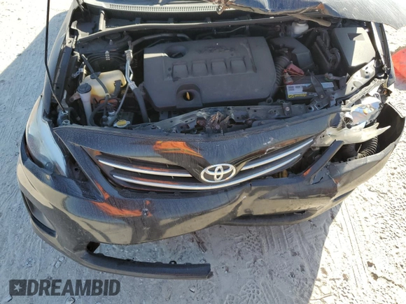 2013 Toyota Corolla L with VIN 5YFBU4EE1DP201779, listed as a Copart auction lot 77087414 with 206,263 mi miles and Salvage Title. Bid and sale history available at carsss.com. Image 11.