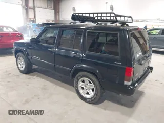 2001 Jeep Cherokee Sport z VIN 1J4FF58S11L562933, wystawiony jako IAAI lot #41944672 z przebiegiem 163 078 mil mil oraz . Historia ofert i sprzedaży dostępna na DreamBid. Obrazek 3.