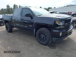 2018 Chevrolet Silverado 1500 LTZ with VIN 3GCUKSEC6JG111742, listed as a IAAI auction lot 42040811 with 148,283 mi miles. Bid and sale history available at carsss.com. Image 1.
