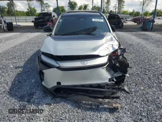 2024 Toyota bZ4X XLE with VIN JTMABACA4RA056975, listed as a Copart auction lot 58435305 with 24,205 mi miles and Salvage title. Bid and sale history available at DreamBid. Image 5.