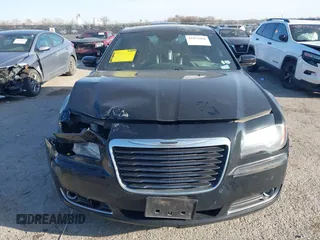 2013 Chrysler 300 with VIN 2C3CCABG7DH573164, listed as a IAAI auction lot 41851066 with 218,234 mi miles. Bid and sale history available at carsss.com. Image 12.
