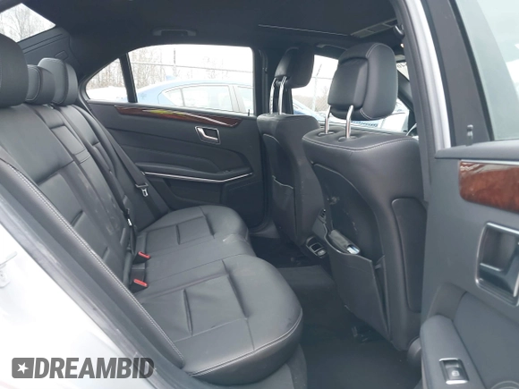 2014 Mercedes-Benz E 350 Luxury with VIN WDDHF8JB0EB075945, listed as a IAAI auction lot 41018546 with 66,678 mi miles and . Bid and sale history available at DreamBid. Image 8.