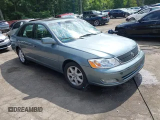 2001 Toyota Avalon XL z VIN 4T1BF28B71U118352, wystawiony jako IAAI lot #42365579 z przebiegiem 124 493 mil mil oraz . Historia ofert i sprzedaży dostępna na DreamBid. Obrazek 1.