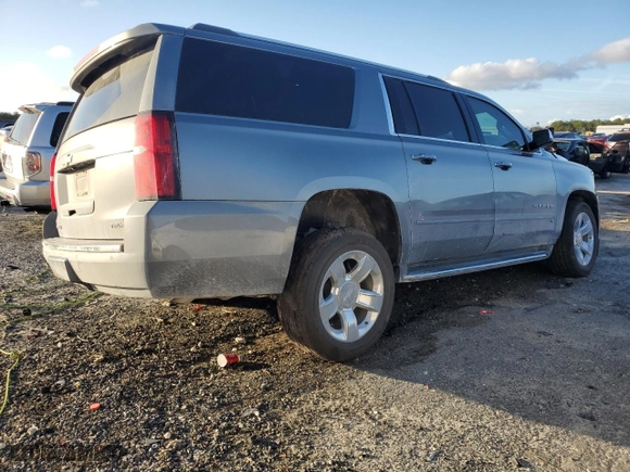 2020 Chevrolet Suburban Premier with VIN 1GNSCJKC5LR163330, listed as a Copart auction lot 85289904 with 83,448 mi miles and Salvage Title. Bid and sale history available at carsss.com. Image 3.