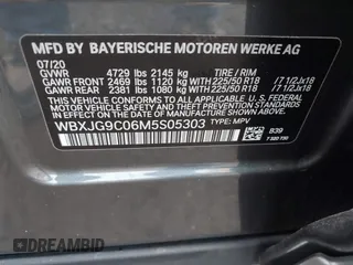 2021 BMW X1 xDrive28i with VIN WBXJG9C06M5S05303, listed as a IAAI auction lot 41060130 with 29,644 mi miles. Bid and sale history available at carsss.com. Image 9.