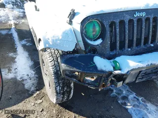 2012 Jeep Wrangler Arctic with VIN 1C4GJWBG9CL290847, listed as a IAAI auction lot 41281316 with 106,473 mi miles. Bid and sale history available at carsss.com. Image 6.
