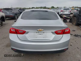 2018 Chevrolet Malibu LT z VIN 1G1ZD5ST6JF261270, wystawiony jako IAAI lot #41932928 z przebiegiem 127 971 mil mil oraz . Historia ofert i sprzedaży dostępna na DreamBid. Obrazek 16.