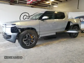 2022 Rivian R1T Launch Edition with VIN 7FCTGAAL7NN006406, listed as a Copart auction lot 49970755 with 1,517 mi miles and Clean Title. Bid and sale history available at carsss.com. Image 1.