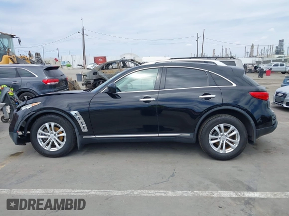 2014 Infiniti QX70 z VIN JN8CS1MW6EM410091, wystawiony jako IAAI lot #41896327 z przebiegiem 139 021 mil mil oraz . Historia ofert i sprzedaży dostępna na DreamBid. Obrazek 14.