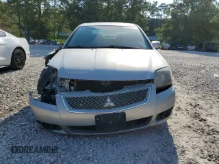 2011 Mitsubishi Galant FE z VIN 4A32B2FF2BE020490, wystawiony jako Copart lot #58146214 z przebiegiem 196 199 mil mil oraz Szkoda całkowita • Salvage title. Historia ofert i sprzedaży dostępna na DreamBid. Obrazek 5.