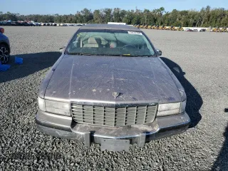 1995 Cadillac Fleetwood z VIN 1G6DW52P7SR706309, wystawiony jako Copart lot #76416794 z przebiegiem Nie podano mil oraz Szkody całkowita. Historia ofert i sprzedaży dostępna na DreamBid. Obrazek 5.
