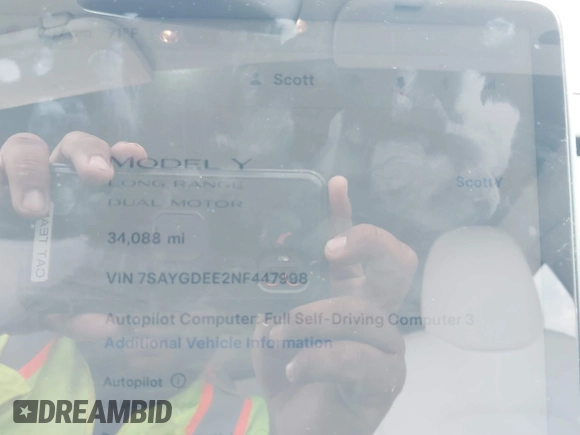 2022 Tesla Model Y Long Range z VIN 7SAYGDEE2NF447998, wystawiony jako IAAI lot #41704968 z przebiegiem 34 088 mil mil oraz . Historia ofert i sprzedaży dostępna na DreamBid. Obrazek 7.