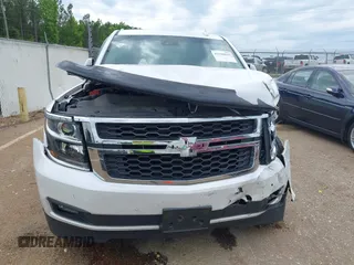 2020 Chevrolet Tahoe LT with VIN 1GNSCBKC4LR181887, listed as a IAAI auction lot 42160821 with 106,757 mi miles and . Bid and sale history available at DreamBid. Image 12.