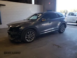 2018 Mazda CX-9 Grand Touring z VIN JM3TCBDY9J0222657, wystawiony jako Copart lot #55725615 z przebiegiem 103 363 mil mil oraz Szkoda całkowita • Salvage title. Historia ofert i sprzedaży dostępna na DreamBid. Obrazek 1.