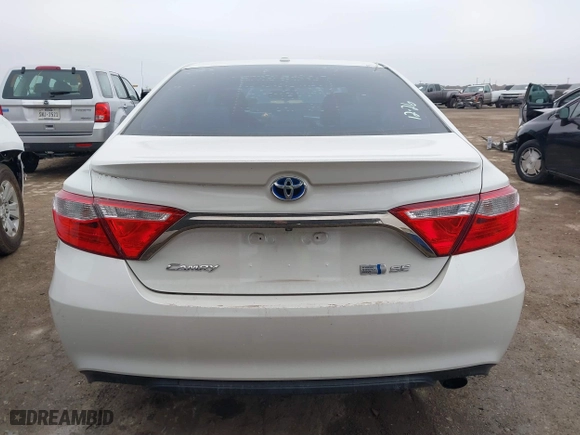 2015 Toyota Camry Hybrid LE with VIN 4T1BD1FK0FU175597, listed as a IAAI auction lot 41455315 with 116,380 mi miles. Bid and sale history available at carsss.com. Image 16.
