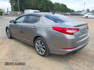 2012 Kia Optima SX with VIN 5XXGR4A6XCG077489, listed as a IAAI auction lot 42158726 with 158,229 mi miles and . Bid and sale history available at carsss.com. Image 3.