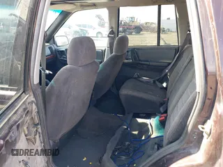 1996 Jeep Grand Cherokee Laredo with VIN 1J4GZ58S2TC262980, listed as a IAAI auction lot 41949514 with 269,674 mi miles and . Bid and sale history available at DreamBid. Image 8.