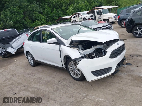 2018 Ford Focus SE z VIN 1FADP3F24JL247003, wystawiony jako IAAI lot #42531969 z przebiegiem 55 344 mil mil oraz . Historia ofert i sprzedaży dostępna na DreamBid. Obrazek 1.