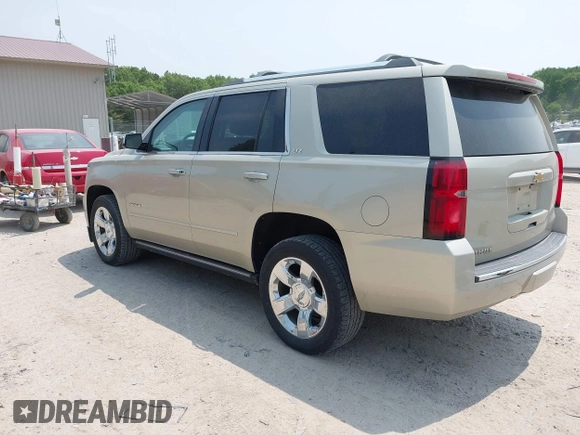 2015 Chevrolet Tahoe LTZ z VIN 1GNSKCKC0FR113647, wystawiony jako IAAI lot #42288089 z przebiegiem 113 322 mil mil oraz . Historia ofert i sprzedaży dostępna na DreamBid. Obrazek 3.
