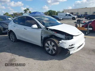 2022 Tesla Model Y Long Range z VIN 7SAYGDEE3NA014770, wystawiony jako IAAI lot #41504372 z przebiegiem 39 746 mil mil oraz . Historia ofert i sprzedaży dostępna na DreamBid. Obrazek 1.