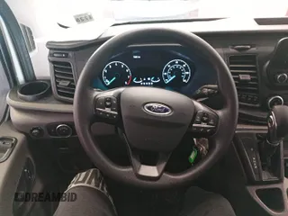 2023 Ford Transit Cargo z VIN 1FTBR1X8XPKC02486, wystawiony jako IAAI lot #42786968 z przebiegiem 7 229 mil mil oraz . Historia ofert i sprzedaży dostępna na DreamBid. Obrazek 3.