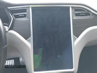 2014 Tesla Model S P85D with VIN 5YJSA1H29EFP63032, listed as a IAAI auction lot 42132145 with Not Provided miles and . Bid and sale history available at DreamBid. Image 7.